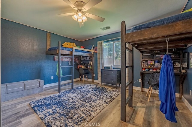 1266 Panorama Point Ct, Merced, CA 95340 - bedroom featuring baseboards, wood finished floors, a desk, and ceiling fan
