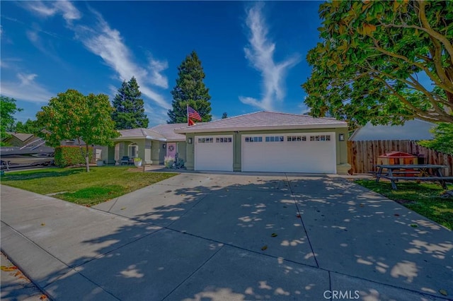 1266 Panorama Point Ct, Merced, CA 95340 - single story home with a garage and stucco siding