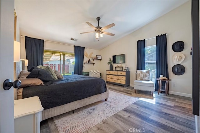 1266 Panorama Point Ct, Merced, CA 95340 - bedroom with vaulted ceiling, wood finished floors, baseboards, and a ceiling fan