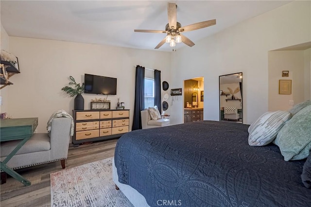 1266 Panorama Point Ct, Merced, CA 95340 - bedroom featuring wood finished floors, ceiling fan, lofted ceiling, and ensuite bath