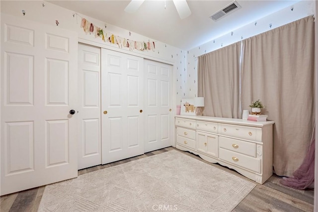 1266 Panorama Point Ct, Merced, CA 95340 - bedroom featuring a closet, light wood finished floors, and ceiling fan