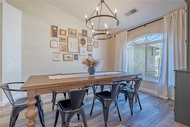 1266 Panorama Point Ct, Merced, CA 95340 - dining room with a chandelier, baseboards, and wood finished floors