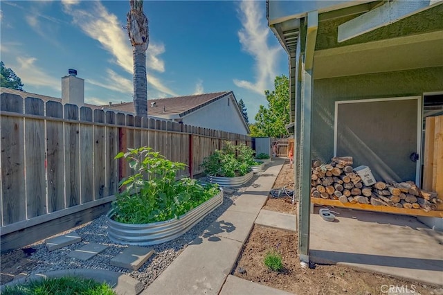 1266 Panorama Point Ct, Merced, CA 95340 - view of patio / terrace with a vegetable garden