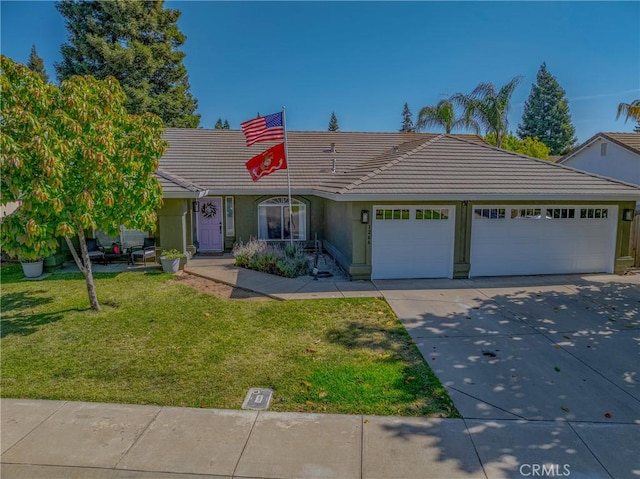 1266 Panorama Point Ct, Merced, CA 95340 - single story home featuring a tiled roof, an attached garage, concrete driveway, a front yard, and stucco siding