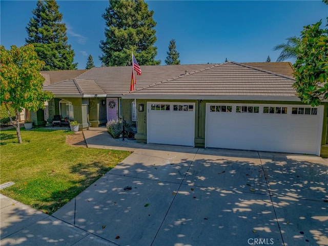 1266 Panorama Point Ct, Merced, CA 95340 - single story home featuring a tile roof, a garage, driveway, and a front yard