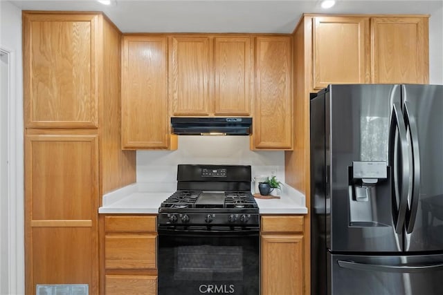 1000 W 11th Ave, Chico, CA 95926 - kitchen featuring black appliances, under cabinet range hood, light countertops, and recessed lighting