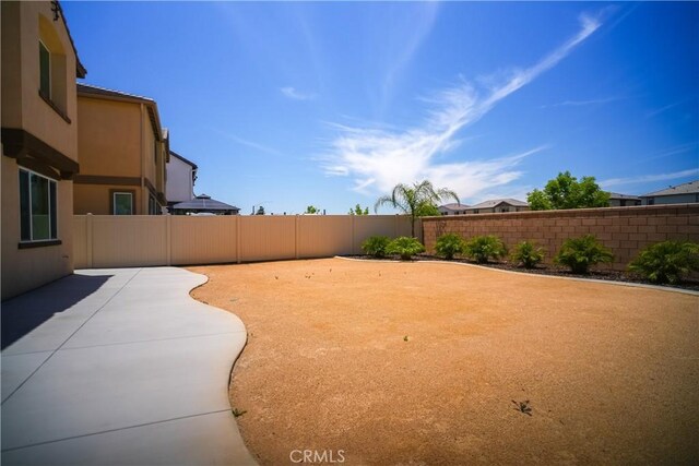 32939 Fleets Rd, Menifee, CA 92584 - fenced backyard featuring a patio