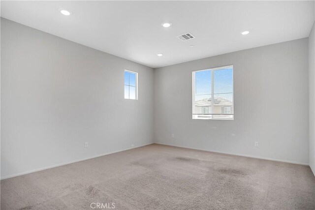 32939 Fleets Rd, Menifee, CA 92584 - empty room with light colored carpet and recessed lighting