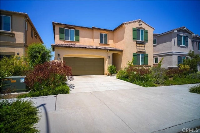 32939 Fleets Rd, Menifee, CA 92584 - mediterranean / spanish home featuring stucco siding, driveway, a tile roof, and an attached garage