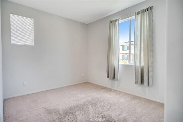 32939 Fleets Rd, Menifee, CA 92584 - empty room with carpet floors and baseboards