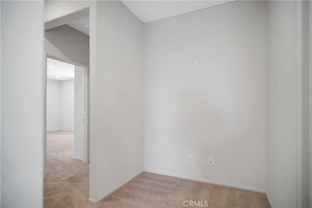 32939 Fleets Rd, Menifee, CA 92584 - unfurnished room with light colored carpet and baseboards