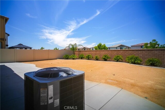 32939 Fleets Rd, Menifee, CA 92584 - fenced backyard featuring a patio area