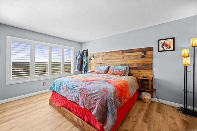 3612 Vista Bella Unit 5, Oceanside, CA 92057 - bedroom featuring wood finished floors and baseboards