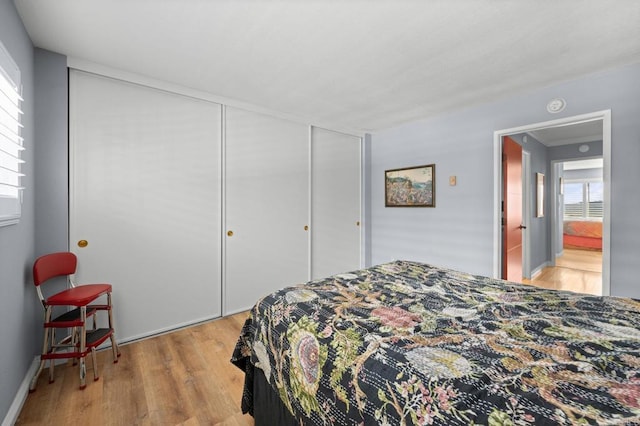 3612 Vista Bella Unit 5, Oceanside, CA 92057 - bedroom featuring light wood finished floors and a closet