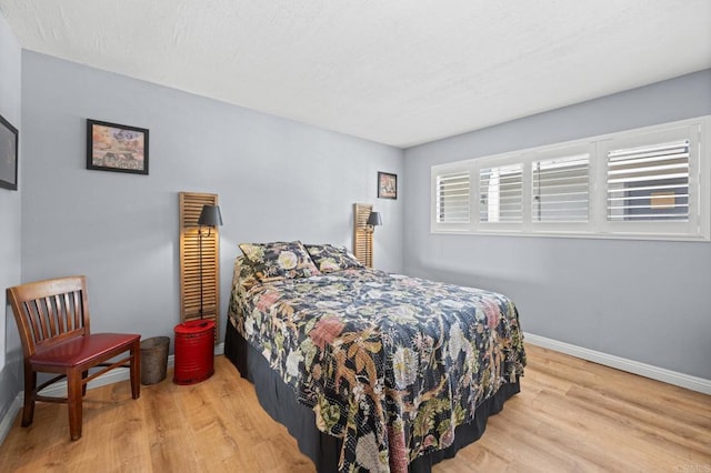 3612 Vista Bella Unit 5, Oceanside, CA 92057 - bedroom featuring wood finished floors and baseboards