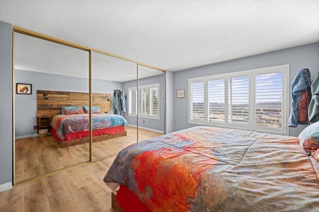 3612 Vista Bella Unit 5, Oceanside, CA 92057 - bedroom with wood finished floors and a closet