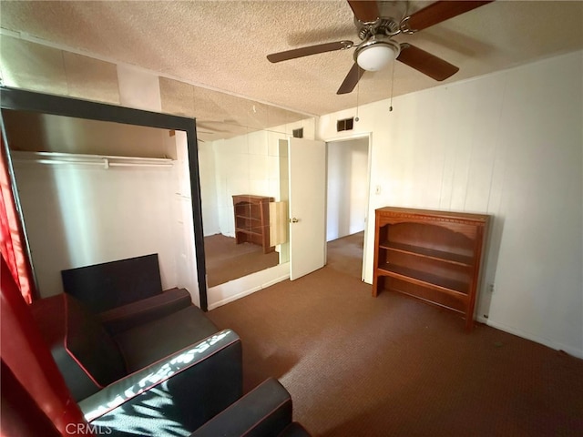 3401 Millbury Ave, Baldwin Park, CA 91706 - carpeted living area featuring a textured ceiling and ceiling fan