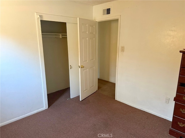 3401 Millbury Ave, Baldwin Park, CA 91706 - unfurnished bedroom featuring carpet flooring, a closet, and baseboards