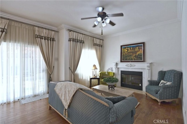 2767 Saleroso Dr, Rowland Heights, CA 91748 - living area featuring ceiling fan, a glass covered fireplace, ornamental molding, and hardwood / wood-style floors