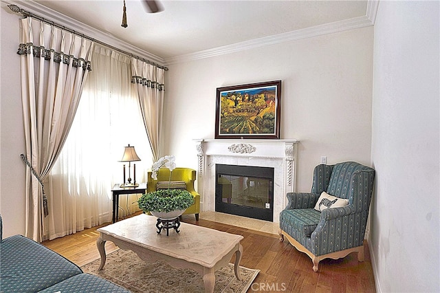 2767 Saleroso Dr, Rowland Heights, CA 91748 - living area with ornamental molding, wood finished floors, a fireplace with flush hearth, and baseboards