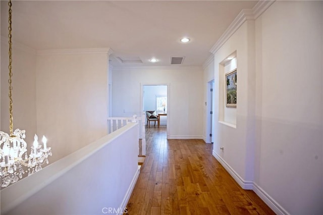 2767 Saleroso Dr, Rowland Heights, CA 91748 - hall with a chandelier, hardwood / wood-style flooring, crown molding, recessed lighting, and baseboards