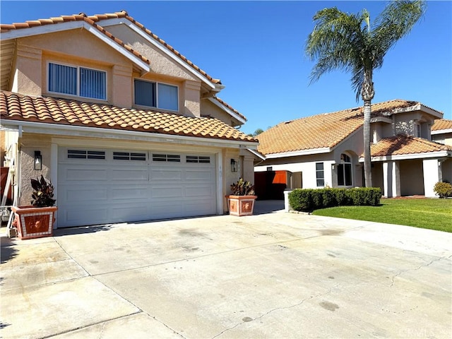 28594 Moon Shadow Dr, Menifee, CA 92584 - mediterranean / spanish house featuring concrete driveway, a tile roof, a garage, and stucco siding