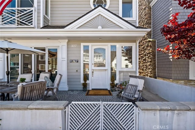 327 Amethyst Ave, Newport Beach, CA 92662 - entrance to property featuring a balcony and covered porch