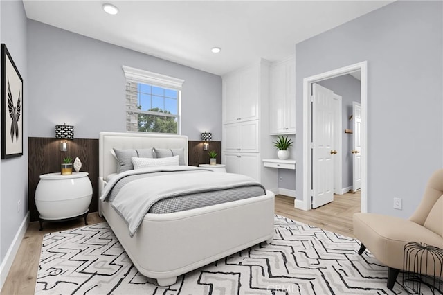 23922 Lakeside Rd, Valencia, CA 91355 - bedroom featuring light wood-style flooring, baseboards, and recessed lighting