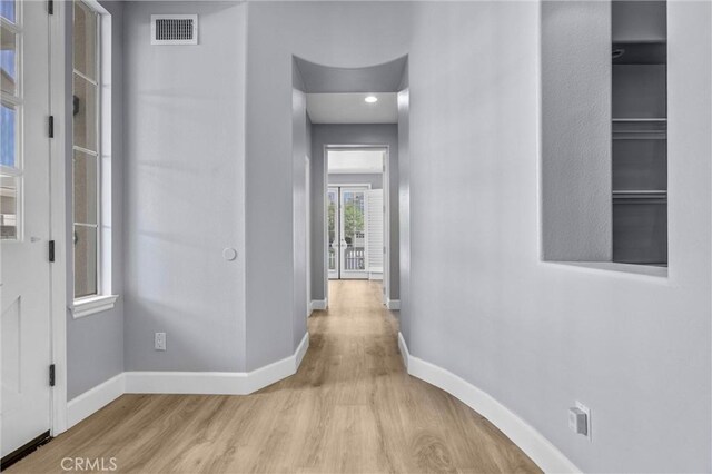23922 Lakeside Rd, Valencia, CA 91355 - corridor featuring wood finished floors and baseboards