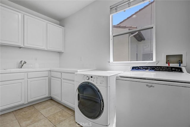 23922 Lakeside Rd, Valencia, CA 91355 - washroom with washer and clothes dryer and cabinet space