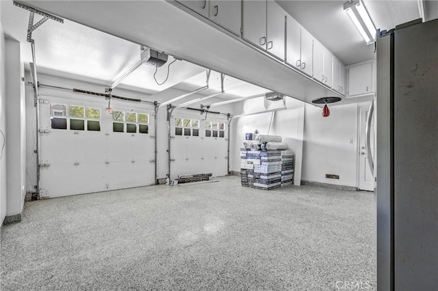 23922 Lakeside Rd, Valencia, CA 91355 - garage featuring a garage door opener