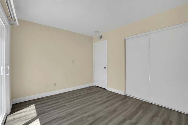 1903 Tomas Ct, Rowland Heights, CA 91748 - unfurnished bedroom featuring wood finished floors, baseboards, and a closet