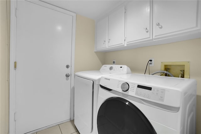 1903 Tomas Ct, Rowland Heights, CA 91748 - laundry area featuring washer and dryer, cabinet space, and light tile patterned floors