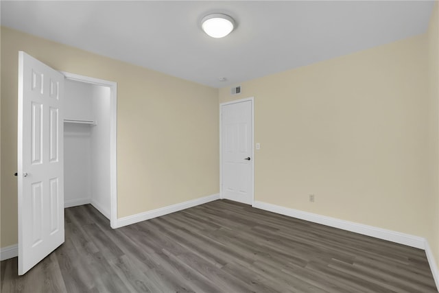 1903 Tomas Ct, Rowland Heights, CA 91748 - unfurnished bedroom with baseboards, dark wood finished floors, and a closet
