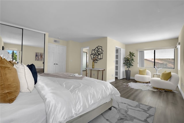 1903 Tomas Ct, Rowland Heights, CA 91748 - bedroom with wood finished floors, multiple windows, and baseboards