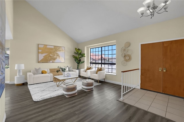 1903 Tomas Ct, Rowland Heights, CA 91748 - living area featuring wood finished floors, a chandelier, baseboards, and high vaulted ceiling