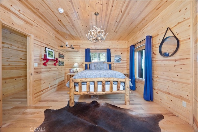 10820 Bonita Way, Wofford Heights, CA 93285 - bedroom featuring a chandelier, wooden walls, hardwood / wood-style flooring, and wood ceiling
