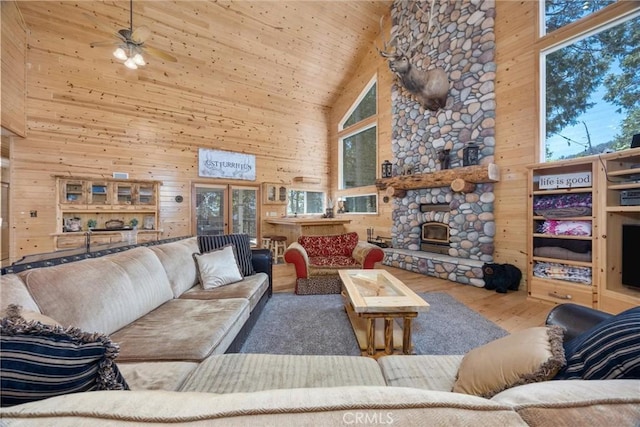 10820 Bonita Way, Wofford Heights, CA 93285 - living area featuring high vaulted ceiling, wood walls, wood finished floors, wood ceiling, and ceiling fan