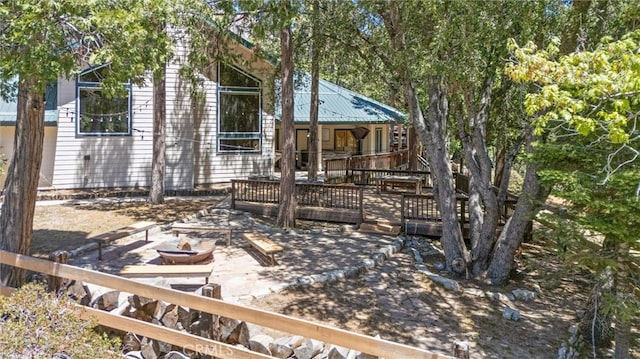 10820 Bonita Way, Wofford Heights, CA 93285 - back of property with a patio and metal roof