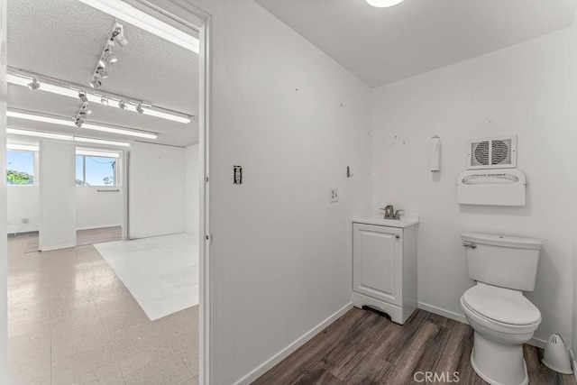 30211 Via Rivera, Rancho Palos Verdes, CA 90275 - bathroom with toilet, baseboards, and a textured ceiling