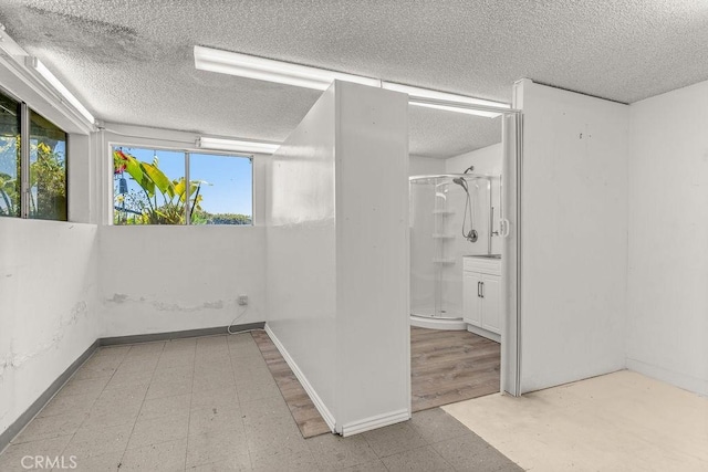 30211 Via Rivera, Rancho Palos Verdes, CA 90275 - empty room with a textured ceiling, tile patterned floors, and baseboards