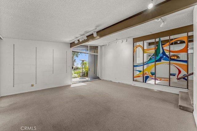 30211 Via Rivera, Rancho Palos Verdes, CA 90275 - carpeted empty room with track lighting, a textured ceiling, and baseboards