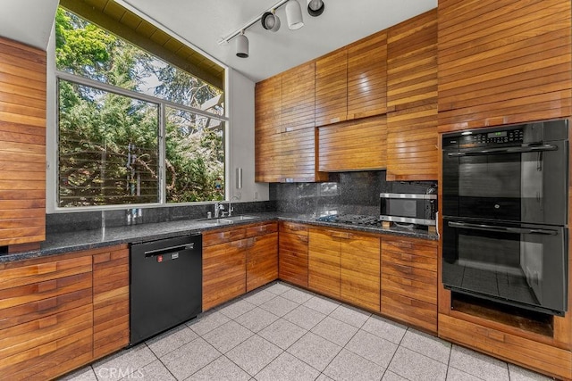30211 Via Rivera, Rancho Palos Verdes, CA 90275 - kitchen with dishwasher, a sink, stainless steel microwave, decorative backsplash, and brown cabinets