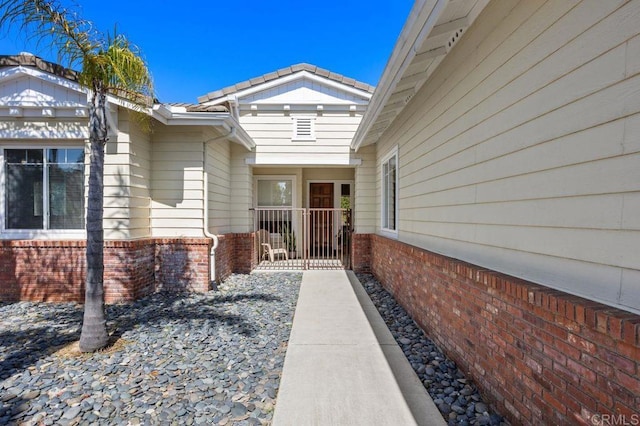 435 Sandalwood Ct, Encinitas, CA 92024 - property entrance featuring brick siding