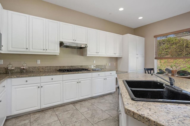 435 Sandalwood Ct, Encinitas, CA 92024 - kitchen featuring under cabinet range hood, a sink, stainless steel gas cooktop, white cabinets, and recessed lighting