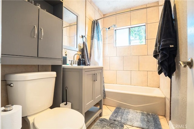 11737 Bellman Ave, Downey, CA 90241 - bathroom with toilet, vanity, tile patterned flooring, and shower / tub combo