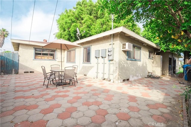 11737 Bellman Ave, Downey, CA 90241 - back of property featuring stucco siding and a patio
