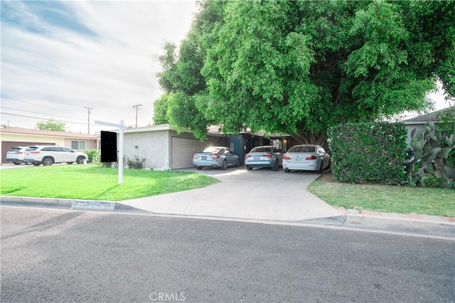 11737 Bellman Ave, Downey, CA 90241 - view of front of home with a front yard and stucco siding