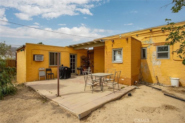 6155 Cahuilla Ave Unit 29, Palms, CA 92277 - back of property with a patio area