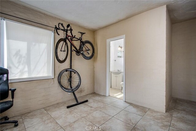6155 Cahuilla Ave Unit 29, Palms, CA 92277 - interior space with light tile patterned flooring and a sink